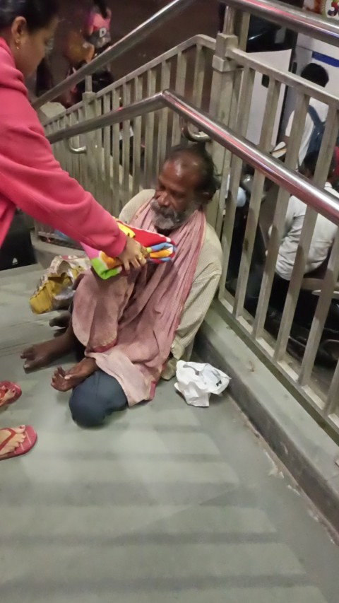 Volunteer distributing at city junction